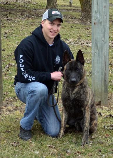 Orleans County Vermont Sheriffs Department Deputy Tyler Jacobs with his new PSD K9 Cher Cars Jonah