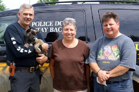 Officer Dennis Robertson of the Lake County Sheriffs Department in Michigan with his future PSD K9 Taser