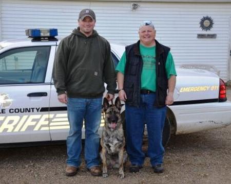 Deputy Matt Duff and K-9 "Bajah" (a Touché x LaBelle Dutch Shepherd puppy born 1/12/2010). Bajah received certification through NAPCH for obedience, narcotics, tracking, article search and area search in October 2010 (when only 9 months old!) and just received certification in aggression and aggression control in October 2011 (at 21 months of age). Bajah is Deputy Duffs working patrol dog for the Hillsdale County Sheriff Department. 