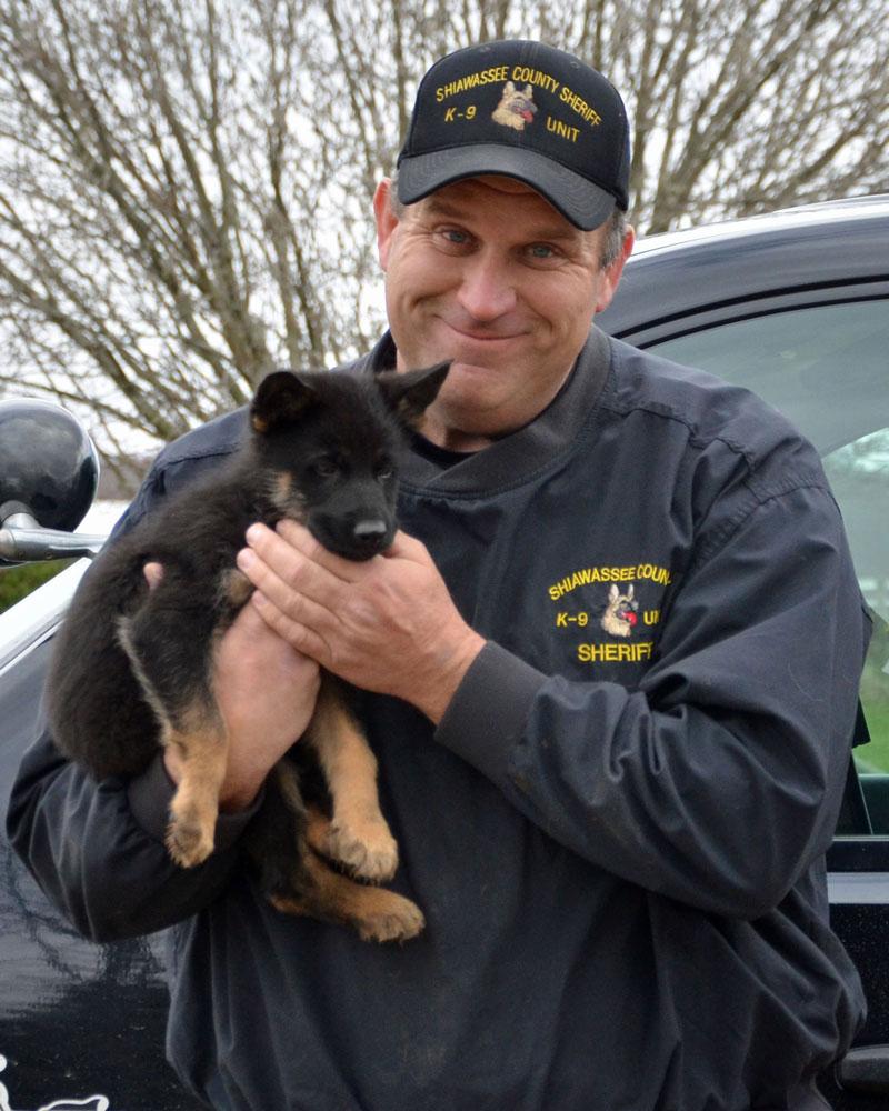 Butch Brancheau of theShiawassee County Sheriff's Department in Corunna, Michigan with his future PSD K9 "Vader"